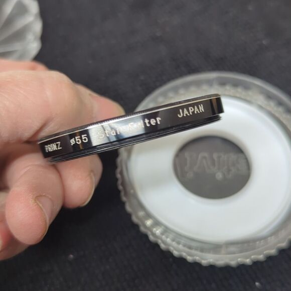 collection of camera lens filters, likely used for photography - Picture 5 of 9